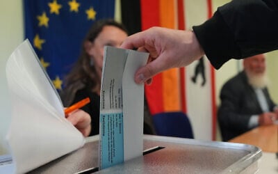 A man casts his vote at a polling station during the Berlin state election in Berlin, Germany, September 20, 2026. (AP Photo/Markus Schreiber) A man casts his vote at a polling station during the Berlin state election in Berlin, Germany, September 20, 2026. (AP Photo/Markus Schreiber)