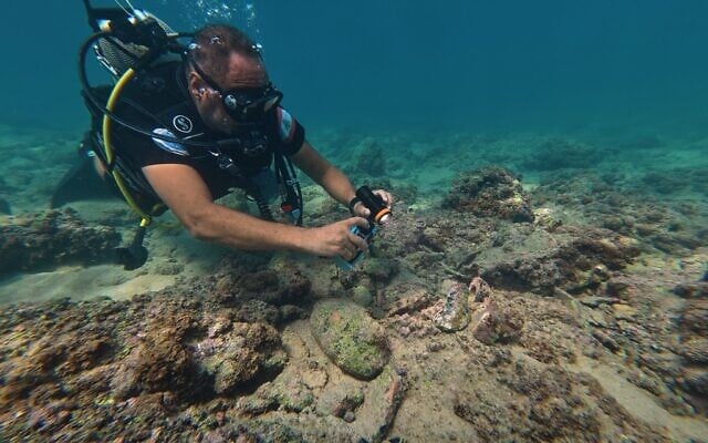 Manager of the Lebanon Diving Center, Youssef Jundi, takes video of pieces of ancient pottery at an archaeological site near the coast in the southern port city of Tyre, Lebanon, September 17, 2026. (Bilal Hussein/AP) Manager of the Lebanon Diving Center, Youssef Jundi, takes video of pieces of ancient pottery at an archaeological site near the coast in the southern port city of Tyre, Lebanon, September 17, 2026. (Bilal Hussein/AP)