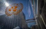 A United Nations logo on a security entrance door to the United Nations compound at the start of the 81st session of the United Nations General Assembly, September 21, 2026, at UN headquarters. (AP Photo/Stefan Jeremiah)