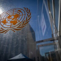 A United Nations logo on a security entrance door to the United Nations compound at the start of the 81st session of the United Nations General Assembly, September 21, 2026, at UN headquarters. (AP Photo/Stefan Jeremiah)