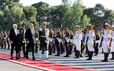 In this photo released by the Iranian Presidency Office, President Masoud Pezeshkian, third left, reviews an honour guard while leaving Mehrabad airport for New York to attend the UN General Assembly, in Tehran, Iran, September 22, 2026. (Iranian Presidency Office via AP) In this photo released by the Iranian Presidency Office, President Masoud Pezeshkian, third left, reviews an honour guard while leaving Mehrabad airport for New York to attend the UN General Assembly, in Tehran, Iran, September 22, 2026. (Iranian Presidency Office via AP)