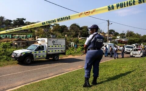 Illustrative: A police officer is seen at a scene of a mass shooting at a house party in KwaMakhutha township south of the city Durban, South Africa, September 23, 2026. (AP Photo)