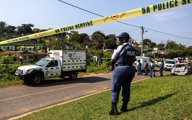 Illustrative: A police officer is seen at a scene of a mass shooting at a house party in KwaMakhutha township south of the city Durban, South Africa, September 23, 2026. (AP Photo) Illustrative: A police officer is seen at a scene of a mass shooting at a house party in KwaMakhutha township south of the city Durban, South Africa, September 23, 2026. (AP Photo)