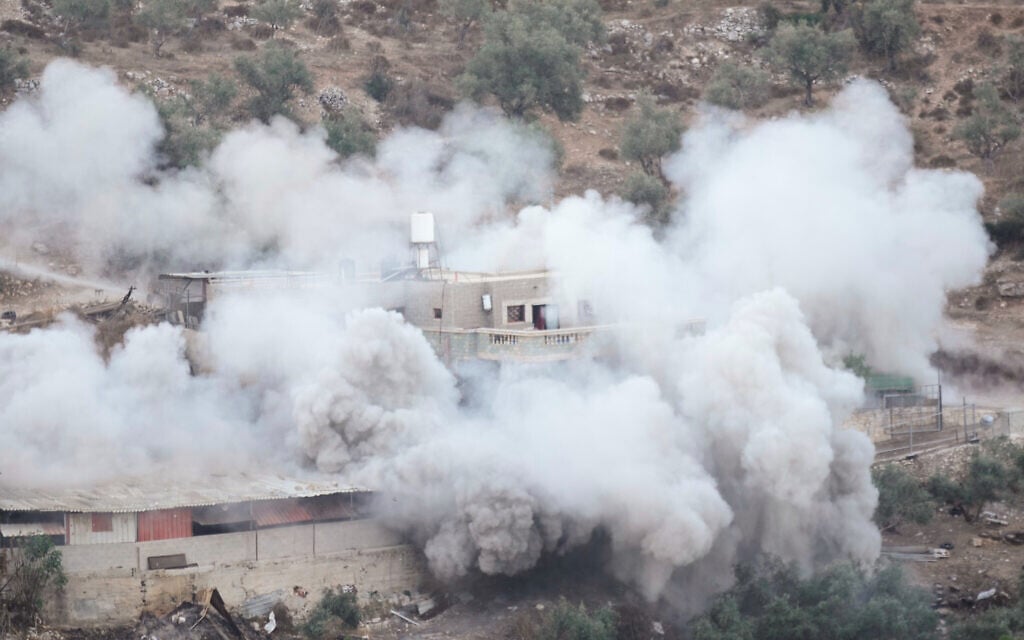 Smoke rises as Israeli forces demolish the home of Palestinian prisoner Dawas Hassouna, who is accused of killing an Israeli settler, in the West Bank village of Beit Amarin, September 24, 2026. (AP Photo/Majdi Mohammed) Smoke rises as Israeli forces demolish the home of Palestinian prisoner Dawas Hassouna, who is accused of killing an Israeli settler, in the West Bank village of Beit Amarin, September 24, 2026. (AP Photo/Majdi Mohammed)