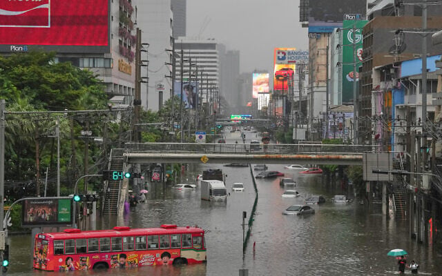 The streets are flooded after heavy rain in Bangkok, Thailand, September 26, 2026. (AP Photo/Sakchai Lalit)