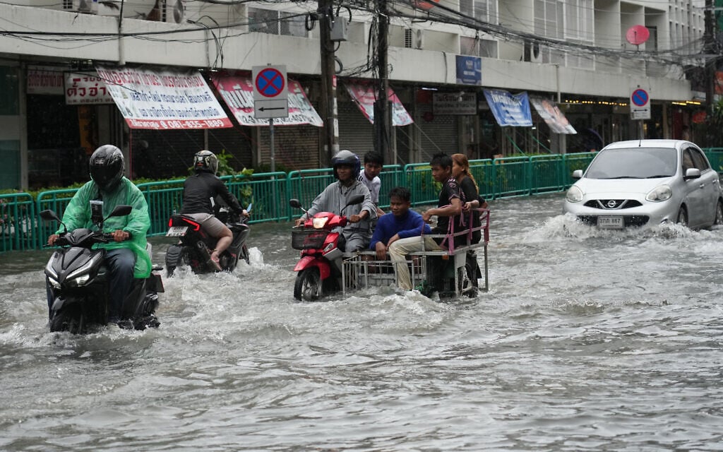 The streets are flooded after heavy rain in Bangkok, Thailand, September 26, 2026. (AP Photo/Sakchai Lalit)
