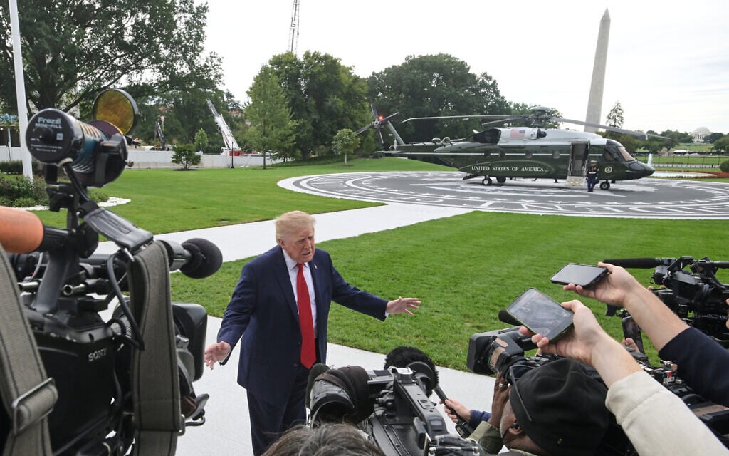 US President Donald Trump talks with reporters on the South Lawn of the White House before boarding Marine One, September 26, 2026, in Washington. (AP Photo/Rod Lamkey, Jr.) US President Donald Trump talks with reporters on the South Lawn of the White House before boarding Marine One, September 26, 2026, in Washington. (AP Photo/Rod Lamkey, Jr.)
