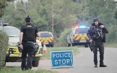 Police stand at a road block on the road to RAF Fairford after an incident, in Whelford, England, September 27, 2026 . (Ben Birchall/PA via AP) Police stand at a road block on the road to RAF Fairford after an incident, in Whelford, England, September 27, 2026 . (Ben Birchall/PA via AP)