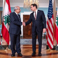 US Secretary of State Marco Rubio, right, shakes hands with Lebanon’s Prime Minister Nawaf Salam at the State Department, September 28, 2026, in Washington. (AP Photo/Mark Schiefelbein)