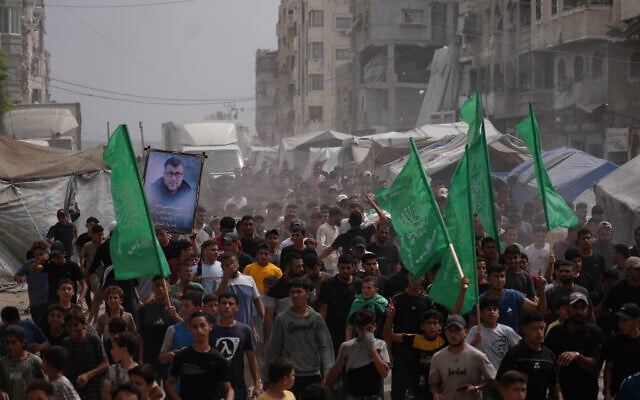 Palestinians carry the bodies of Hamas terrorists Mohannad Abu Foul and Izz al-Din al-Bik, during their funeral after they were killed in an Israeli airstrike, in Gaza City, September 29, 2026. (AP Photo/Jehad Alshrafi)