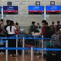 Passengers wait in line to check in their luggage with flydubai at Ben Gurion International Airport, near Tel Aviv, Israel, September 30, 2026. (AP Photo/Ariel Schalit)