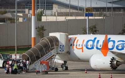 Passengers embark on a FlyDubai aircraft at Ben Gurion International Airport, near Tel Aviv, Israel, September 30, 2026. (AP Photo/Ariel Schalit)