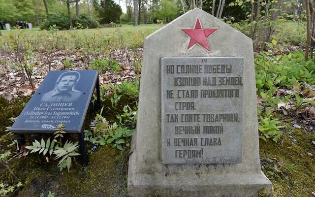 A Russian grave is pictured on the Soviet cemetery in Schloss Holte-Stukenbrock, western Germany, near the Nazi prisoner-of-war camp Stalag 326, May 6, 2015. (AP Photo/Martin Meissner)