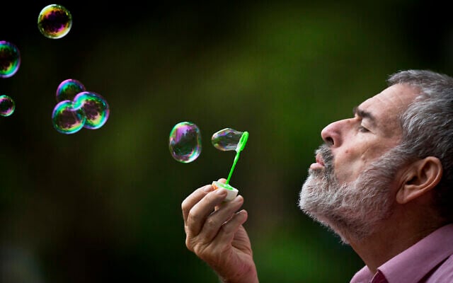 Portrait of Yehuda Atlas, children’s book writer. December 03, 2012. (Moshe Shai/FLASH90)