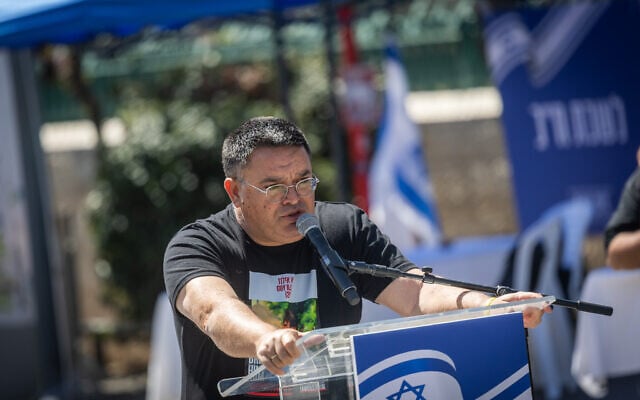 MK Michael Biton speaks during a press conference outside the Knesset in Jerusalem, March 31, 2025. (Chaim Goldberg/Flash90)