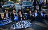 Ultra orthodox Jews clash with police during a protest against the drafting of ultra orthodox jews to the Israeli army, on road 4 near Bnei Brak, August 08, 2026. (Avshalom Sassoni/Flash90)