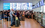 Illustrative: Passengers at the Ben Gurion International airport near Tel Aviv, August 23, 2026. (Avshalom Sassoni/Flash90)