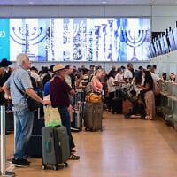 Illustrative: Passengers at the Ben Gurion International airport near Tel Aviv, August 23, 2026. (Avshalom Sassoni/Flash90)