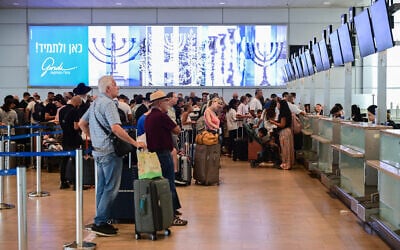 Illustrative: Passengers at the Ben Gurion International airport near Tel Aviv, August 23, 2026. (Avshalom Sassoni/Flash90) Illustrative: Passengers at the Ben Gurion International airport near Tel Aviv, August 23, 2026. (Avshalom Sassoni/Flash90)