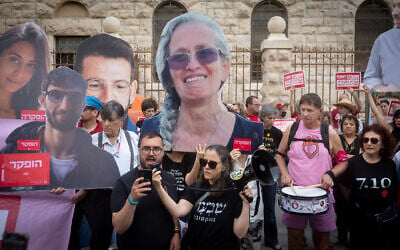 Israeli protesters hold large photographs of Israeli hostages who were killed in Hamas captivity, as they demonstrate on August 31, 2026, outside the Prime Minister's Residence in Jerusalem calling for a state commission of inquiry into failures surrounding the October 7, 2023, Hamas attack. (Chaim Goldberg/FLASH90) Israeli protesters hold large photographs of Israeli hostages who were killed in Hamas captivity, as they demonstrate on August 31, 2026, outside the Prime Minister's Residence in Jerusalem calling for a state commission of inquiry into failures surrounding the October 7, 2023, Hamas attack. (Chaim Goldberg/FLASH90)