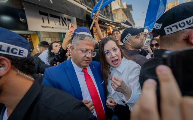 National Security Minister Itamar Ben-Gvir,  and MK Tally Gotliv, a new member of his Otzma Yehudit party, tour the Mahane Yehuda Market in Jerusalem ahead of the upcoming general elections, September 4, 2026. (Chaim Goldberg/Flash90)