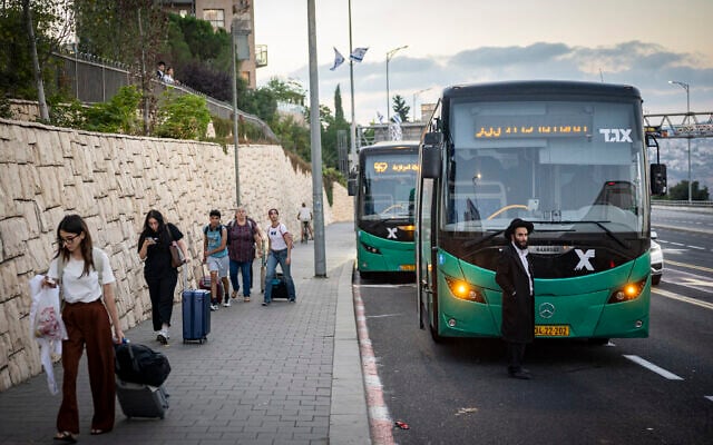 Ultra-Orthodox Jews block buses from entering Jerusalem during a protest against the operation of buses on Shabbat, at the entrance to Jerusalem, September 5, 2026. (Yonatan Sindel/Flash90)