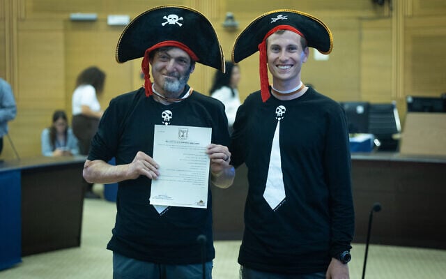 Members of the Pirate Party of Israel submit their candidate list to the Central Elections Committee ahead of the upcoming election, at the Knesset, in Jerusalem, September 7, 2026. (Yonatan Sindel/Flash90)
