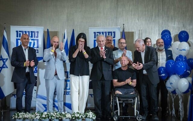 Prime Minister Benjamin Netanyahu presents the new members joining the Likud party’s candidate list ahead of the upcoming general elections, in Jerusalem, from left to right: Amir Avivi (who relinquished his spot on the list), David Peter, Talik Gvili, Netanyahu, Jacob Bardugo (behind), Itzik Bonzel, Elisha Madan (in front), Eli Goldschmidt.  September 8, 2026. (Chaim Goldberg/Flash90)