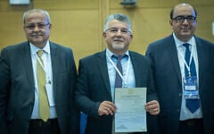Joint List members Ta'al leader MK Ahmad Tibi (Left), Hadash leader Yousef Jabareen (center), and Balad leader Sami Abu Shehadeh (right) submit their party’s candidate list to the Central Elections Committee ahead of the upcoming election, at the Knesset, Jerusalem, September 8, 2026. (Yonatan Sindel/Flash90)