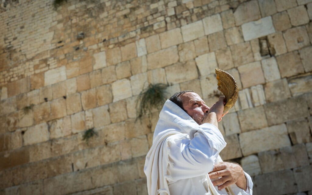 A Jew blows the shofar at the Western Wall in the Old City of Jerusalem ahead of Rosh Hashanah, September 9, 2026. (Chaim Goldberg/Flash90) A Jew blows the shofar at the Western Wall in the Old City of Jerusalem ahead of Rosh Hashanah, September 9, 2026. (Chaim Goldberg/Flash90)