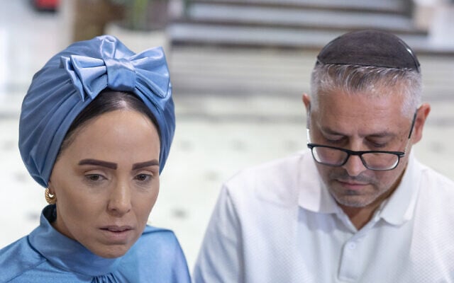 Tamar and Amos, the parents of Hillel Mordechai Dadon, at the court as charges were filed against 26-year-old Liel Ifergen, for murdering their son, at the Jerusalem District Court, September 14, 2026. (Yonatan Sindel/Flash90)