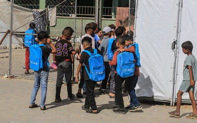 Palestinian students attend the first day of the new school year in Khan Yunis, in the southern Gaza Strip, wearing blue UNICEF backpacks, September 19, 2026. (Abed Rahim Khatib/Flash90) Palestinian students attend the first day of the new school year in Khan Yunis, in the southern Gaza Strip, wearing blue UNICEF backpacks, September 19, 2026. (Abed Rahim Khatib/Flash90)