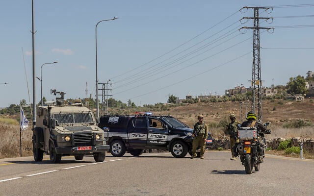 Israeli soldiers and police officers near the scene of a shooting attack at a spring near the Israeli settlement of Neve Tzuf in the West Bank, September 20, 2026. (Hilel Ben Or/Flash90)
