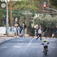 People ride bicycles in Jerusalem on the eve of Yom Kippur, the Day of Atonement and the holiest day in the Jewish calendar, September 20, 2026. (Yonatan Sindel/Flash90)