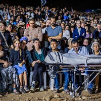 Family and friends attend the funeral of Netanel Shukrun, who was killed in a terror shooting attack at a spring near Neve Tzuf in the West Bank, at the cemetery in his community of Alei Zahav, September 21, 2026. (Hilel Ben Or/Flash90)