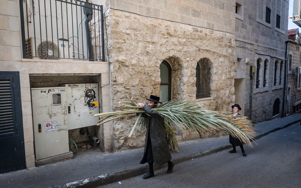 An Ultra-Orthodox Jewish man walks in the Mea Shearim neighborhood of Jerusalem ahead of the Jewish holiday of Sukkot, September 23, 2026. (Chaim Goldberg/Flash90) An Ultra-Orthodox Jewish man walks in the Mea Shearim neighborhood of Jerusalem ahead of the Jewish holiday of Sukkot, September 23, 2026. (Chaim Goldberg/Flash90)