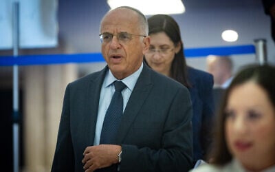 Chairman of the Central Elections Committee and Supreme Court Deputy President Noam Sohlberg arrives for a CEC hearing at the Knesset in Jerusalem on September 23, 2026. (Yonatan Sindel/Flash90)
