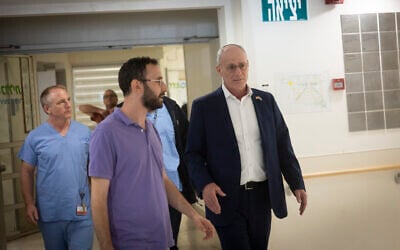 Israel's Ambassador to the US Yechiel Leiter (R) at Shaare Zedek Medical Center in Jerusalem, after his son, an IDF soldier, was hospitalized in critical condition after being seriously wounded in a car-ramming attack, September 24, 2026. (Chaim Goldberg/Flash90) Israel's Ambassador to the US Yechiel Leiter (R) at Shaare Zedek Medical Center in Jerusalem, after his son, an IDF soldier, was hospitalized in critical condition after being seriously wounded in a car-ramming attack, September 24, 2026. (Chaim Goldberg/Flash90)