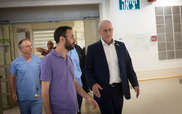 Israel's Ambassador to the US Yechiel Leiter (R) at Shaare Zedek Medical Center in Jerusalem, after his son, an IDF soldier, was hospitalized in critical condition after being seriously wounded in a car-ramming attack, September 24, 2026. (Chaim Goldberg/Flash90)