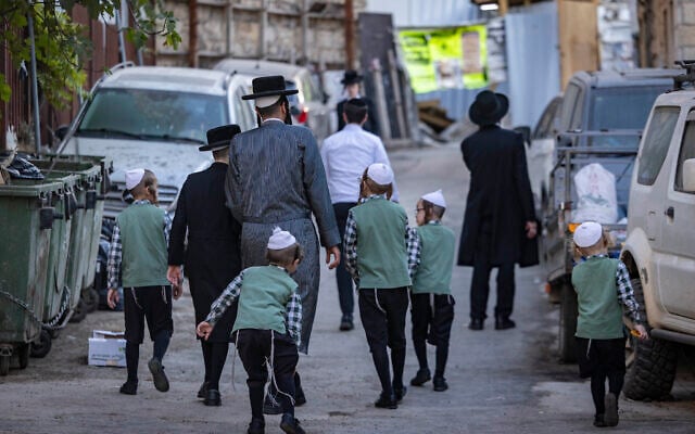 Ultra-Orthodox Jews make preparations for the Jewish holiday of Sukkot in the Mea Shearim neighborhood of Jerusalem, September 24, 2026. (Chaim Goldberg/Flash90)