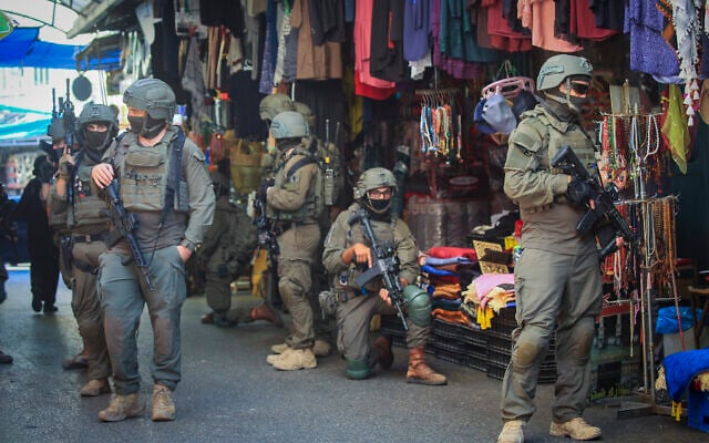 IDF soldiers take part in a military operation in the market in the Old City of Nablus, in the northern West Bank, September 27, 2026. (Nasser Ishtayeh/Flash90)