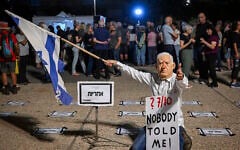 Protesters demonstrate against Prime Minister Benjamin Netanyahu and his government near the 'Sukkah of the Failure' event at Hostages Square in Tel Aviv, during the holiday of Sukkot, September 28, 2026. (Avshalom Sassoni/Flash90)