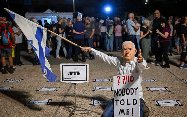 Protesters demonstrate against Prime Minister Benjamin Netanyahu and his government near the "Sukkah of the Failure" event at Hostages Square in Tel Aviv, during the holiday of Sukkot, September 28, 2026. (Avshalom Sassoni/Flash90) Protesters demonstrate against Prime Minister Benjamin Netanyahu and his government near the "Sukkah of the Failure" event at Hostages Square in Tel Aviv, during the holiday of Sukkot, September 28, 2026. (Avshalom Sassoni/Flash90)