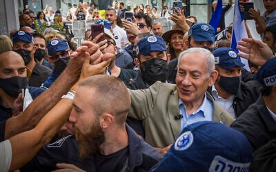 Prime Minister Benjamin Netanyahu, surrounded by supporters, during an election campaign tour in the southern city of Ashdod, September 29, 2026. (Liron Moldovan/Flash90) Prime Minister Benjamin Netanyahu, surrounded by supporters, during an election campaign tour in the southern city of Ashdod, September 29, 2026. (Liron Moldovan/Flash90)