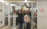 Passengers from a flydubai flight whose copilot allegedly sought to hijack and crash the plane arrive at Ben Gurion Airport, September 30, 2026. (Avshalom Sassoni/Flash90)