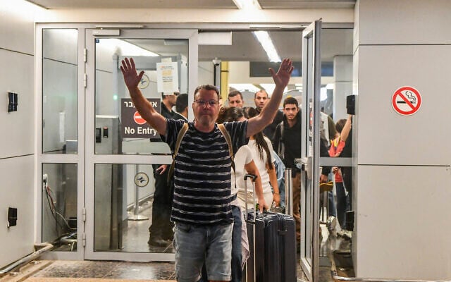 Passengers from a flydubai flight whose copilot allegedly sought to hijack and crash the plane arrive at Ben Gurion Airport, September 30, 2026. (Avshalom Sassoni/Flash90)