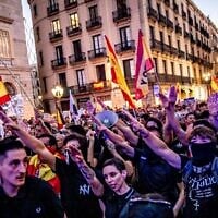 Núcleo Nacional demonstrators raise their arms during a rally in Barcelona, Spain, September 2, 2026. (Albert Llop/NurPhoto via JTA)