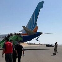 Passengers disembark from a flydubai Boeing 737 MAX from Dubai to Tel Aviv which landed at Tabuk Airport in Saudi Arabia, September 30, 2026. The rudder shows damage. The flight suffered an emergency mid-air, with the copilot subdued after stabbing the captain in an alleged attempt to crash the plane full of Israelis, September 30, 2026 (Social media: used in accordance with Clause 27a of the Copyright Law)