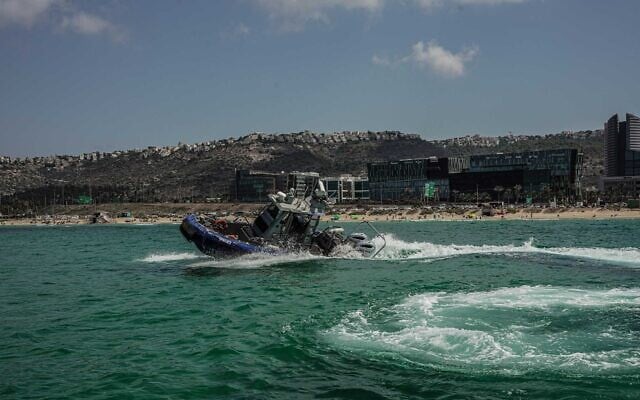 A police boat searching for a man who went missing, in Haifa, in an image published on September 12, 2026. (Israel Police)