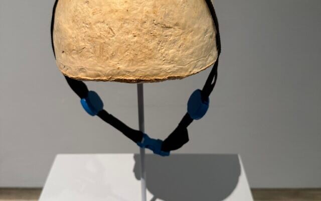 Biodegradable, grow-your-own cycle helmet made of fungal threads, at The Circle, the new exhibition at the Holon Design Museum, central Israel, September 9, 2026. (Sue Surkes/Times of Israel) Biodegradable, grow-your-own cycle helmet made of fungal threads, at The Circle, the new exhibition at the Holon Design Museum, central Israel, September 9, 2026. (Sue Surkes/Times of Israel)